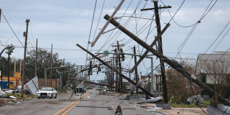 LAKE CHARLES, LOUISIANA - AUGUST 27: A street is seen strewn with debris and downed power lines after Hurricane Laura passed through the area on August 27, 2020 in Lake Charles, Louisiana . The hurricane hit with powerful winds causing extensive damage to the city. Joe Raedle/Getty Images/AFP