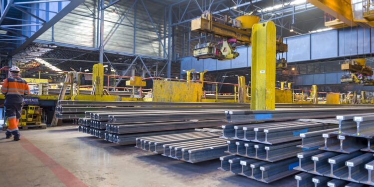 A picture shows rails at the Saarsthal rail plant in Hayange, eastern France, on September 13, 2021. - The German steel group Saarstahl was authorized to buy from British Liberty Steel group, the Ascoval steel plant and the rails plant of Hayange. (Photo by JEAN-CHRISTOPHE VERHAEGEN / AFP)