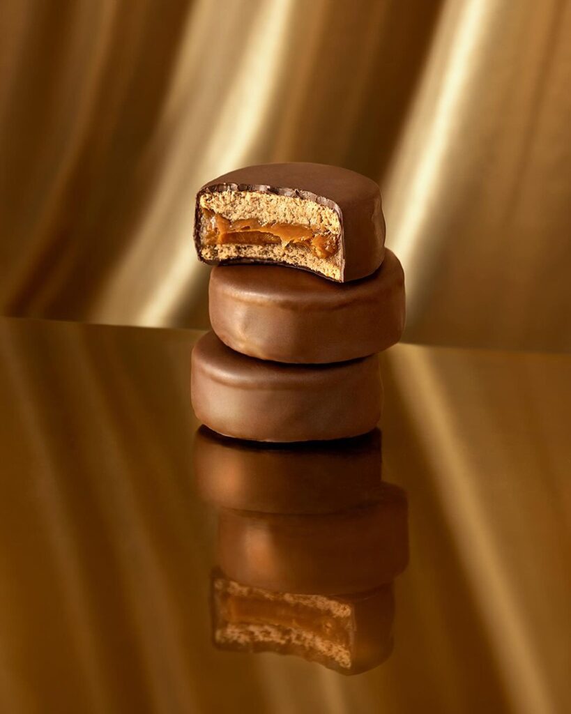alfajor lucciano's de chocolate amargo  y dulce de leche