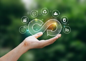 Hand of human holding circular economy icon.
