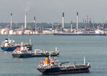 Ships and the massive refinery at Singapore