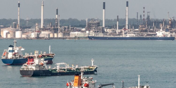 Ships and the massive refinery at Singapore