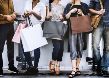 Female friends out shopping together